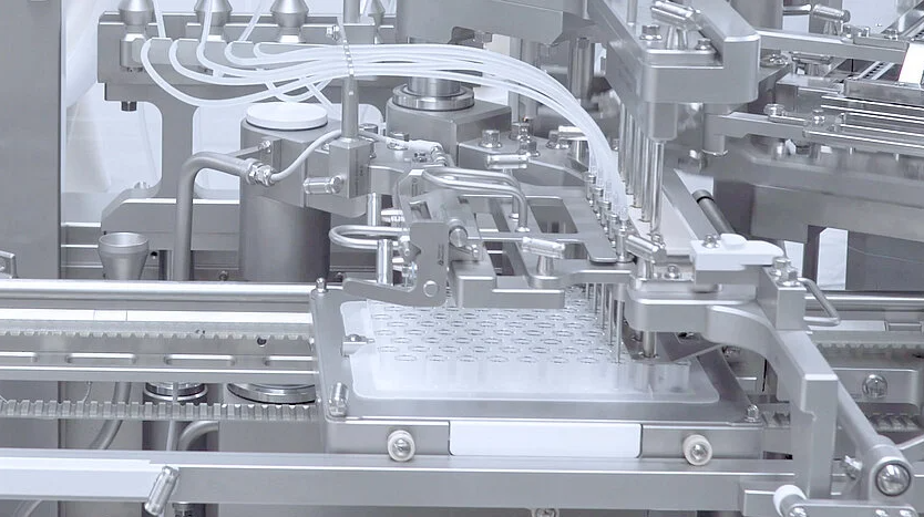 Syringe filling machine