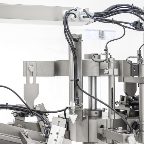 parts of a tube filling machine