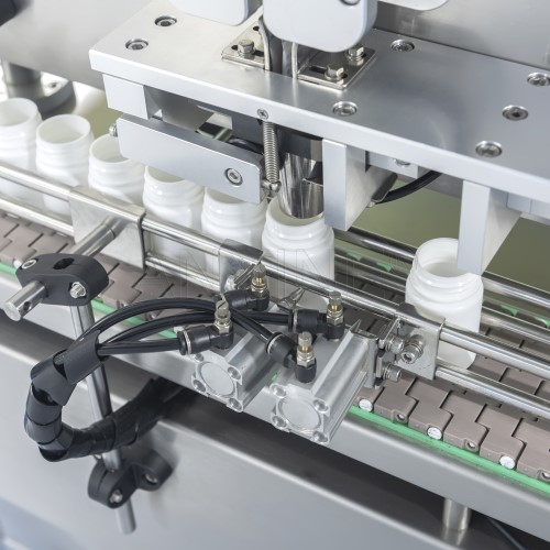Bottle Positioning Mechanism